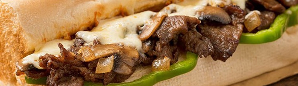 up close image of a steak and cheese
